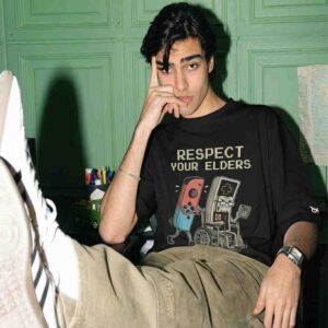 Respect Your Elders Gaming Consoles Switch VS Old Console Controller Oversized Front Printed Black T-Shirt ooltaseedha.com